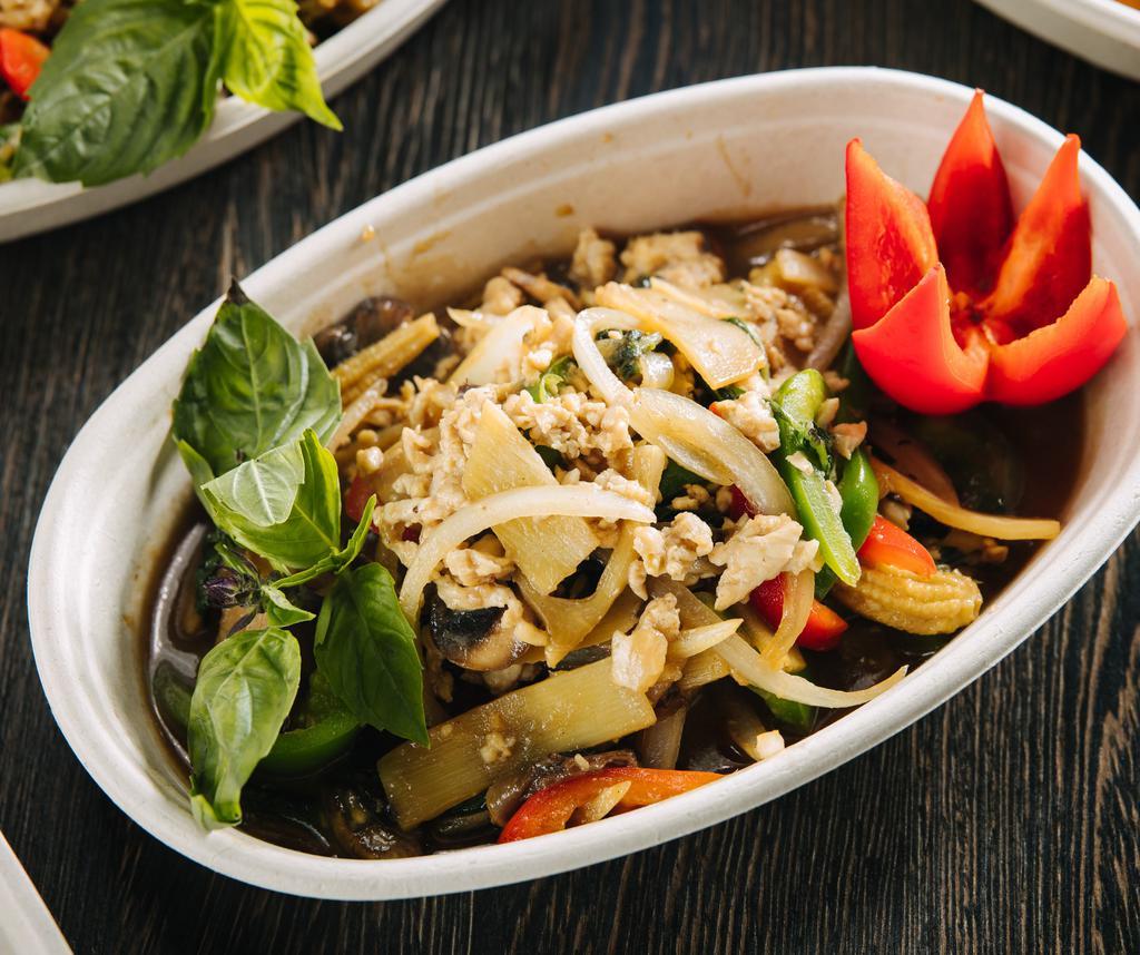 27. Thai Spicy Basil Stir Fry · Bamboo shoots, basil, mushrooms, baby corn, white onions, bell peppers, garlic.