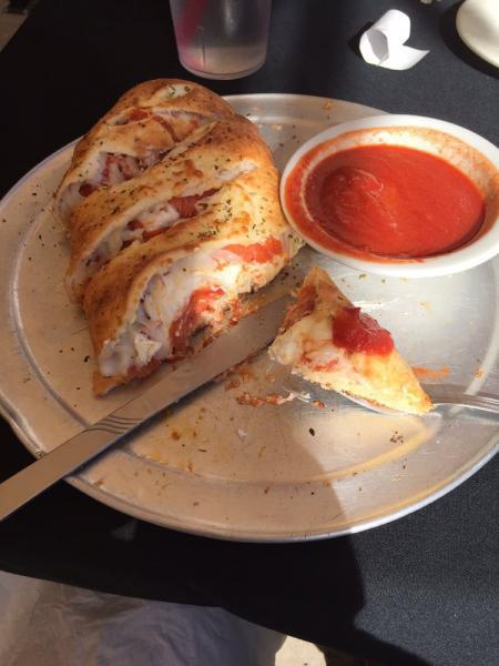 Stromboli · Includes ham, pepperoni and mozzarella cheese wrapped in our homemade dough. 