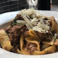 TAGLIATTELLE WITH BOLOGNESE	 · TAGLIATTELLE BOLOGNESE	
Traditional Bolognese Sauce
