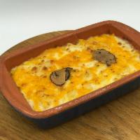 SLOW BAKED MAC & CHEESE WITH SLICED TRUFFLE · MACCHERONI al TARTUFO	
Slow Baked Mac & Cheese, Black Truffle Carpaccio