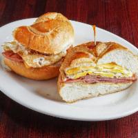 Fried Egg and Cheese with Meat · Pan-cooked eggs. Hot sandwich filled with cheese that has been pan cooked or grilled.
