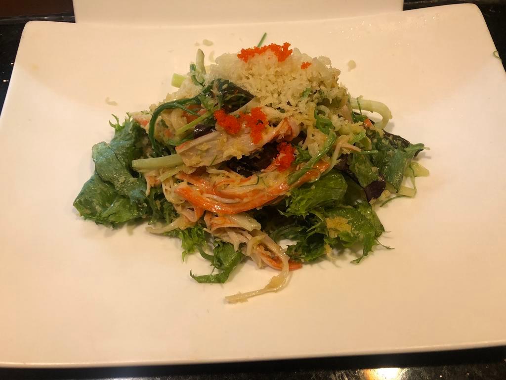 6. Kani Salad · Imitation crab with organic mixed greens in spicy dressing.