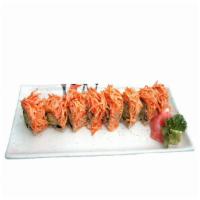 H18. Volcano Roll · Avocado and cucumber with crunch inside, topped with spicy crab. Eight pieces.