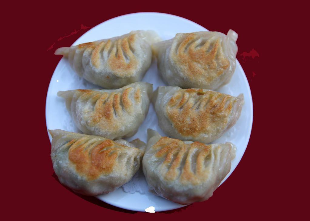 38. Pan Fried Dumplings · 6 pieces.