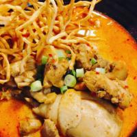 P2. Khao Soi Gai · Traditional Northern style coconut curry.
Cooked with egg noodles, white meat chicken and a ...
