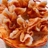 A4 Crab Rangoons (Six pieces) · Imitation crab meat with cream cheese wrapped in won-ton skin and deep fried, served with sw...