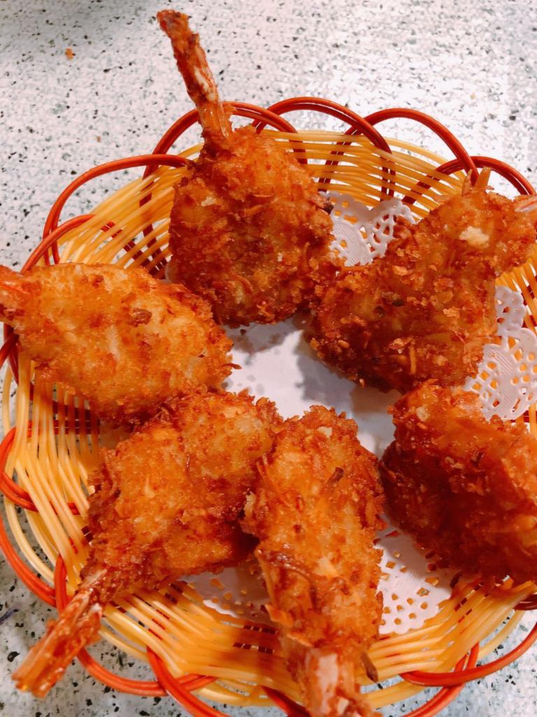 A7 Coconut Shrimp (Six pieces) · Individual shrimp dipped in coconut batter.
Then rolled in an aromatic combination of coconut flakes breadcrumbs. Served with special style Mayonnaise on side.