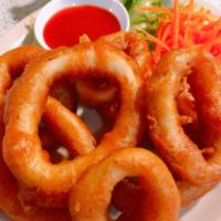 A10. Calamari · Golden fried, hand battered calamari serve with sweet and sour sauce. 
