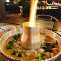 Tom Kha Soup (Small without rice) · Tom yum paste, mushrooms, cilantro and coconut milk cooked in vegetable broth.