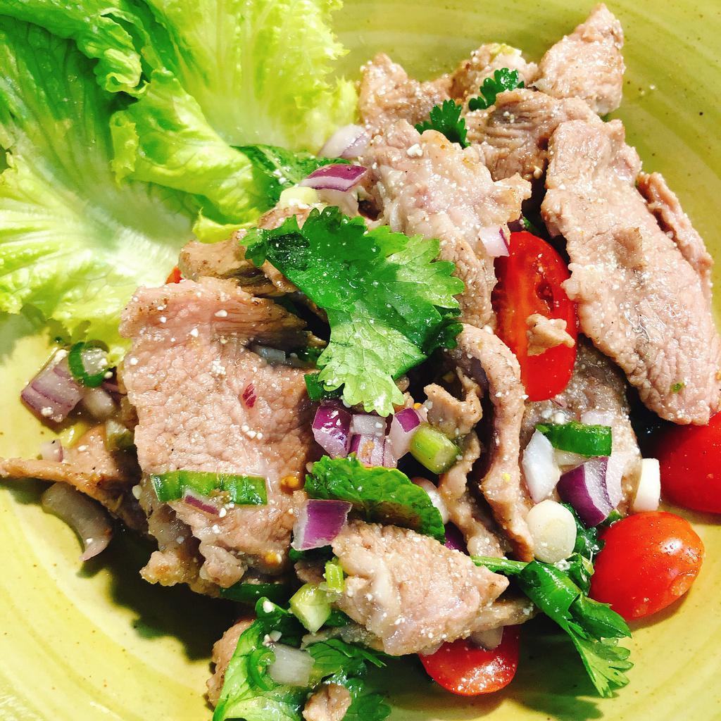 Waterfalls Salad · (GF*)Choice of sliced chicken, pork or beef (+$1) mixed with chopped green onion, cilantro, mint, red onion, *fish sauce, lime juice, sweet syrup and rice powder, served with lettuce, cucumber and jasmine rice on the side 
