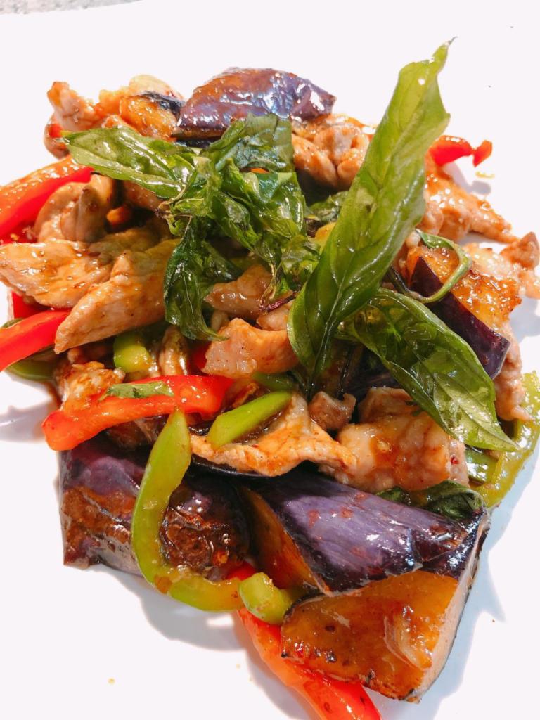 R8. Thai Eggplant · (GF*) Stir fried eggplant, bell pepper, yellow onion, basil leaves and some of soy bean paste in brown sauce*