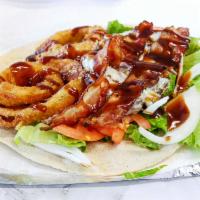 Texas Rodco Wrap · Angus beef with bacon, onion rings and BBQ sauce.