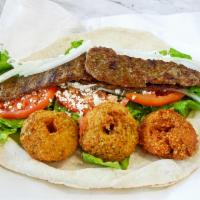 Gyro Falafel Wrap · Combination of our gyro and falafel with lettuce, tomatoes, onions and tzatziki dressing.