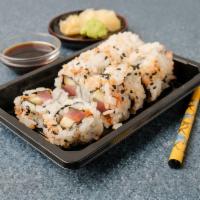 Spicy Tuna Roll · Raw. Tuna, cucumber and scallion. Inside out with sesame seeds.