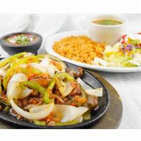Pork Chops · 2 grilled pork chops topped with sauteed onions, tomatoes, and bell peppers. Served on a siz...