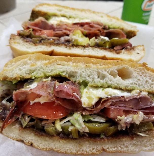 Hamon con Queso Torta (ham n cheese) · All tortas are made with refried beans, tomatoes, Oaxaca cheese, guacamole, jalapenos and lettuce. 