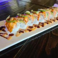 Black Pepper Salmon Roll · California roll with seared salmon on top spicy mayo and unagi sauce with jalapeno, black pe...