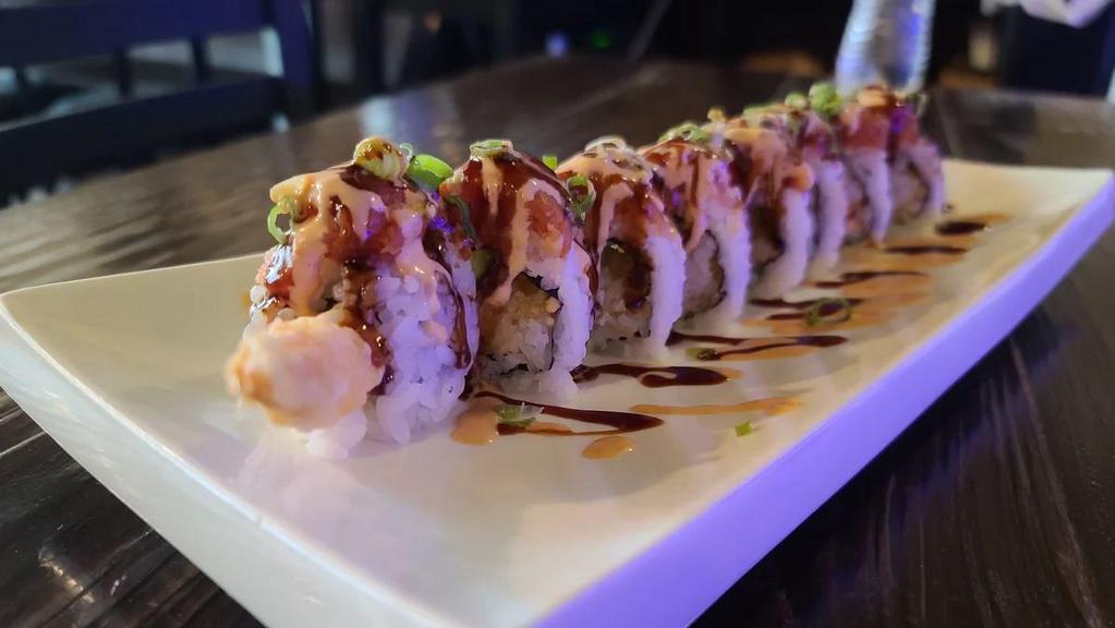 Red Dragon Roll · Shrimp tempura roll with spicy tuna on top and spicy mayo, unagi sauce and scallion.