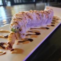 White Dragon Roll · Shrimp tempura roll with crab on top and spicy mayo, unagi sauce and scallion.