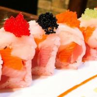 23. Christmas Roll · 10 pieces. Fresh tuna, salmon, white tuna, yellowtail topped with spicy scallop and 4 kinds ...