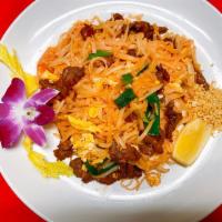 Pad Thai · Stir-fried Thai flat rice noodle choice of chicken, beef or pork, tofu, eggs ground peanut, ...