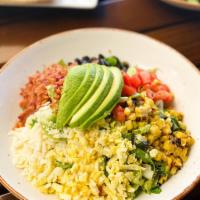 Texas Cobb Salad · Mixed greens, cilantro, Cotija, bacon, black beans, tomatoes, boiled eggs, and Cotija cilant...