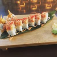 Red Sea Roll · Raw. Shrimp tempura, avocado, topped with spicy crunchy tuna, tobiko. Spicy.