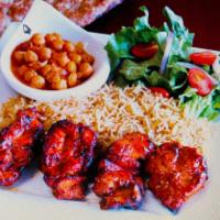 Chicken Kabob Bone-In · Chicken legs and thighs are cut in small pieces then marinated in spices, herbs in our speci...