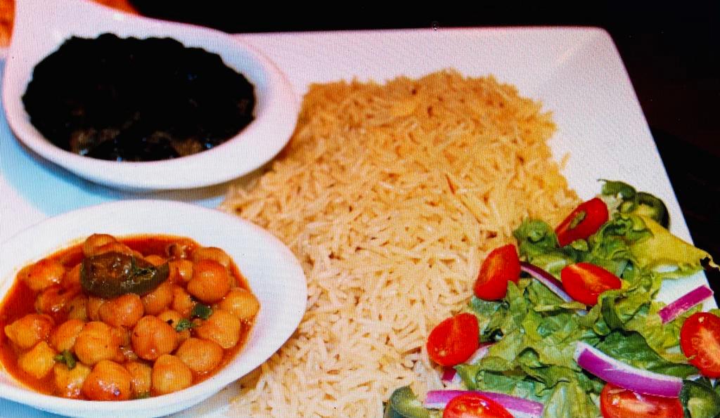 Vegetarian Combo · Combination platter served with nan (Afghan bread).