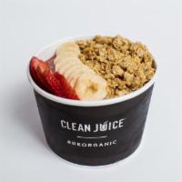 The Nutty Bowl · Acai Blended with Banana, Strawberries, Almond Butter, Cacao, Camu Camu, Maple Syrup & Almon...