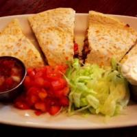 Quesadillas · Chicken, chorizo or steak: veggies, salsa, sour cream.