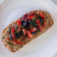 Almond Butter Toast and Jam · Fresh baked country bread, house-made almond butter and jam with fresh berries.