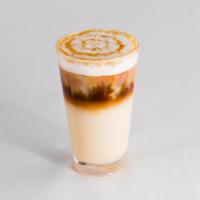 Caramel Macchiato 22oz · Four shot espresso w/ milk of your choice and a hint of caramel and vanilla.