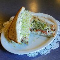 Sacks Symphony Sandwich · Turkey breast, bacon, avocado, tomato, alfalfa sprouts, cream cheese, and mayonnaise on 12-g...