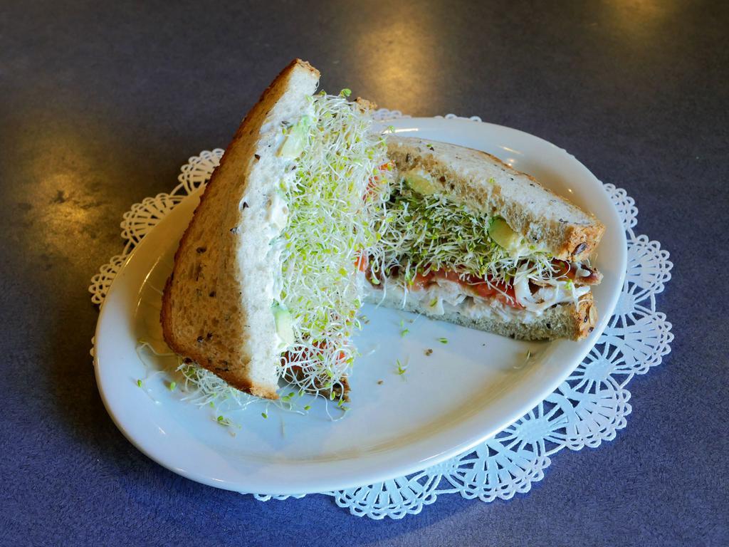 Sacks Symphony Sandwich · Turkey breast, bacon, avocado, tomato, alfalfa sprouts, cream cheese, and mayonnaise on 12-grain bread.