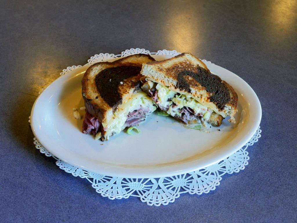 Sacks Rubens Sandwich-Hot · Pastrami, Swiss cheese, homemade coleslaw, and 1000 island, on marble rye.
