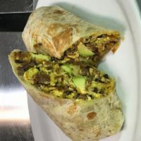 Southwest Burrito · Scrambled eggs, hash browns, avocado, melted pepper jack cheese and chorizo wrapped in a flo...