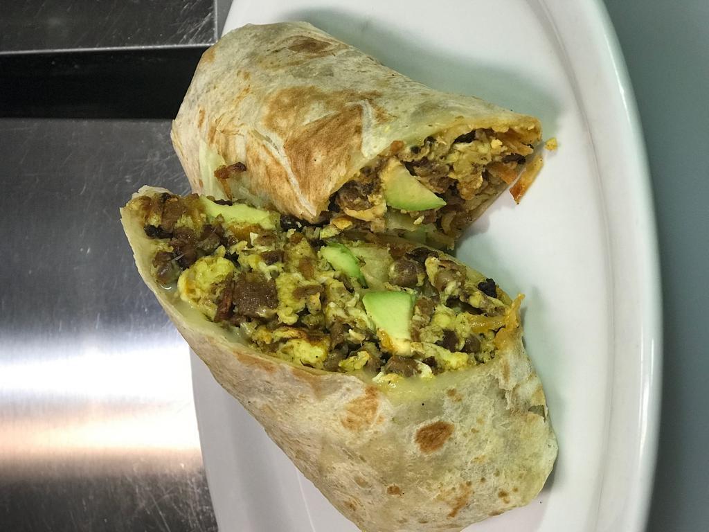 Southwest Burrito · Scrambled eggs, hash browns, avocado, melted pepper jack cheese and chorizo wrapped in a flour tortilla
