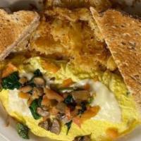 Veggie Omelette · Grilled Mushrooms, Onions, Spinach and Tomatoes with Provolone cheese, House made Hash Brown...