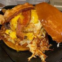 The Hung Over Burger · Half pound burger, House made Hash browns, American cheese, Bacon, Over Medium egg, Mayo on ...