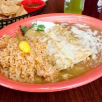 2 Enchiladas Suizas · Chicken enchiladas topped with chile verde sauce and garnished with sour cream. Served with ...