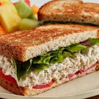 Homemade Chicken Salad Sandwich · Served with mixed lettuce and tomato on toasted wheat bread. Served with chips.