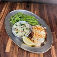 Chicken Chesapeake · chicken breast stuffed with lump crab meat topped with creamy seafood sauce & served with ma...