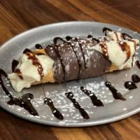 Holy Cannoli · Crispy fried cannoli shell filled with Double espresso vodka infused sweet ricotta cream wit...