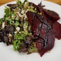 Beet Salad · House prepared beets over arcadian greens tossed with candied walnuts, gorgonzola crumbles w...