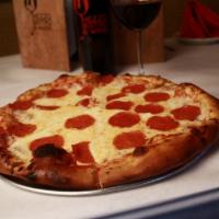 Pepperoni Pizza · Marinara with pepperoni and mozzarella.