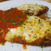 Chicken Parmesan · Chicken cutlet, breaded and fried, with marinara sauce, covered with mozzarella and Parmesan...