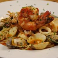 Frutti di Mare · Clams, mussels, calamari, shrimp and salmon sauteed with sherry wine with fresh herbs tossed...