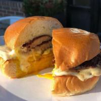 Breakfast Sandwich · egg & cheese with your choice of bacon, smoked ham (+1), brisket (+2) or sausage on a brioch...