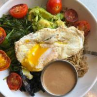 Buddha Bowl · Warm quinoa, sauteed baby kale, avocado, portobello mushrooms, tomato, and a soft egg with y...